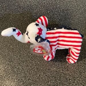 NWT Vintage “Righty 2000” Beanie Baby.Date of birth 7/4/2000. Plastic tag holder